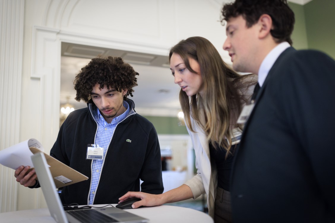 Team reviewing digital prototype during user research session