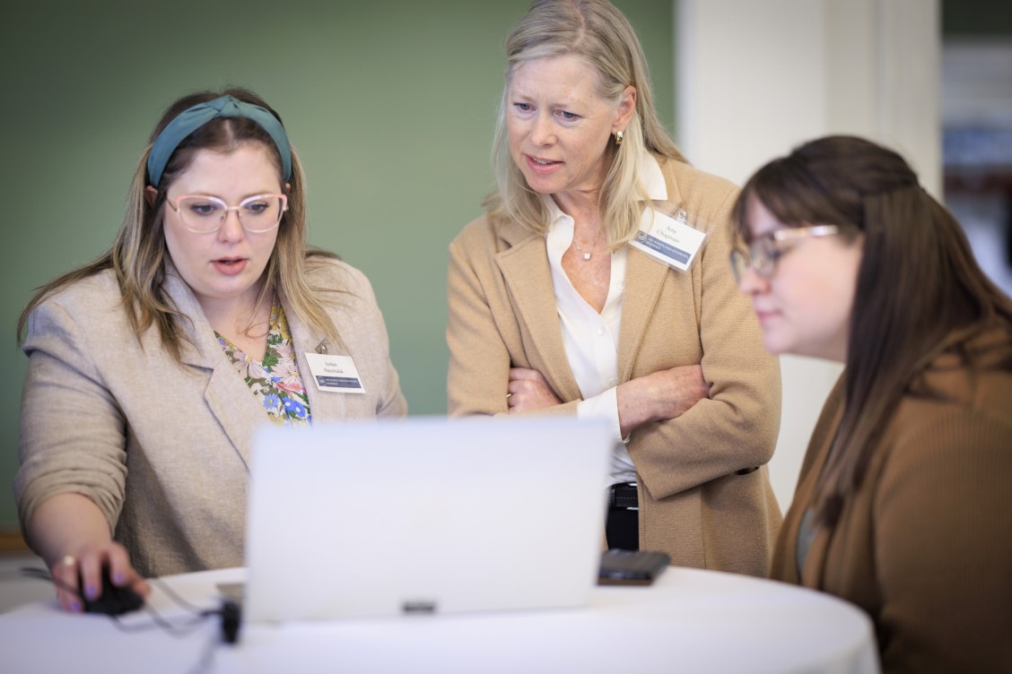 Participants testing a digital prototype during a research session